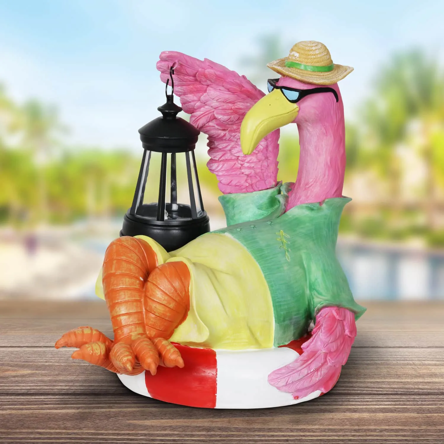 Flamingo Holding a Solar Lantern Garden Statue, 8 by 11 Inches